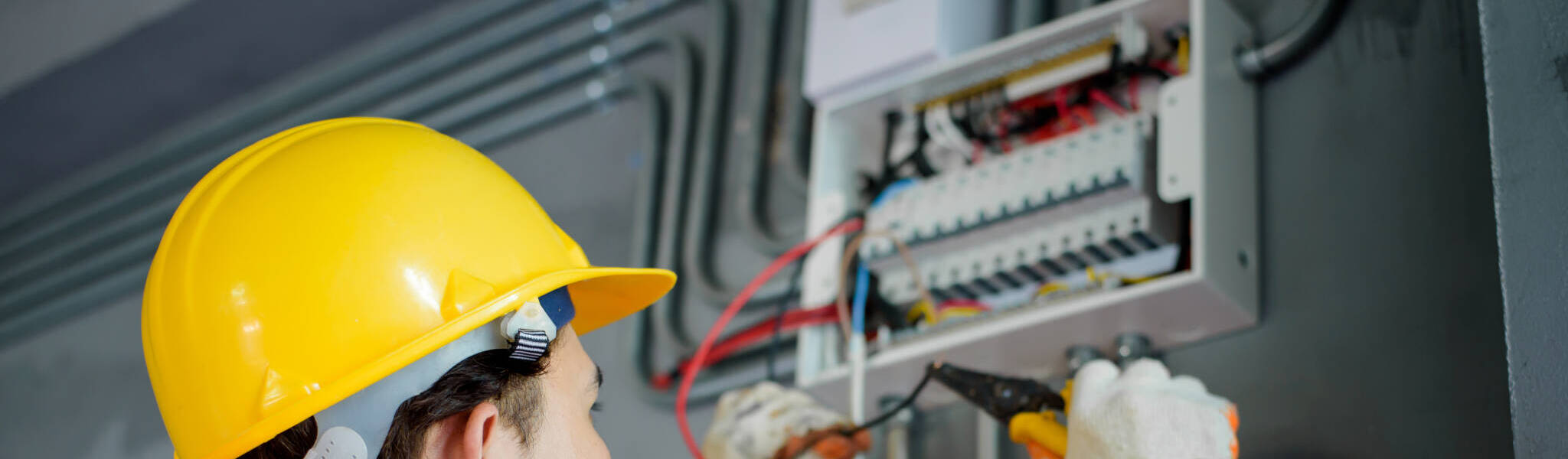 Asian Male Electricians Inspect And Install Electrical Systems I